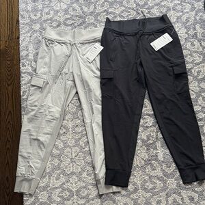 Two pairs of Athleta NWT Sutton joggers - light gray and black - size 6